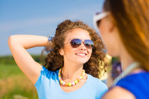 three young attractive girls having fun together, spend fun time with friends