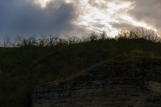   landscape  with sky, clouds, grass and stone