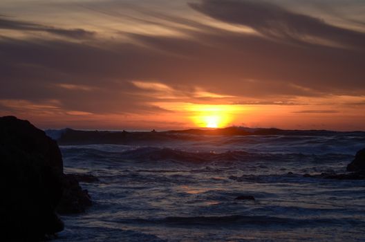 Beach, water under sunset scene in portugal