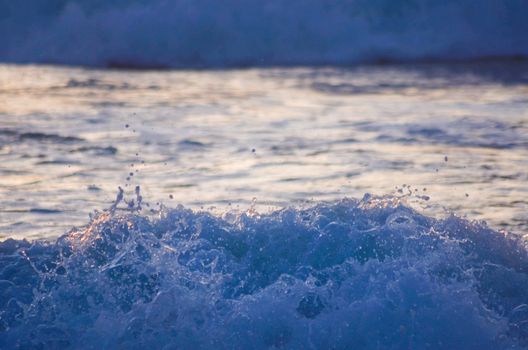 Beach, water under sunset scene in portugal