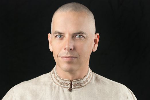 Close-up of a buddhist looking to camera,