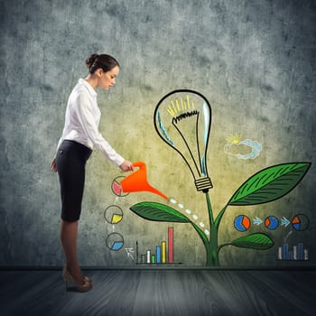 image of a businessman with a watering can