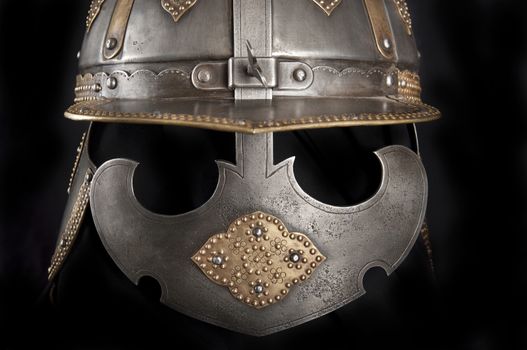 Iron helmet of the medieval knight. Very heavy headdress