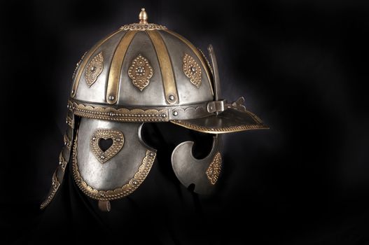 Iron helmet of the medieval knight. Very heavy headdress