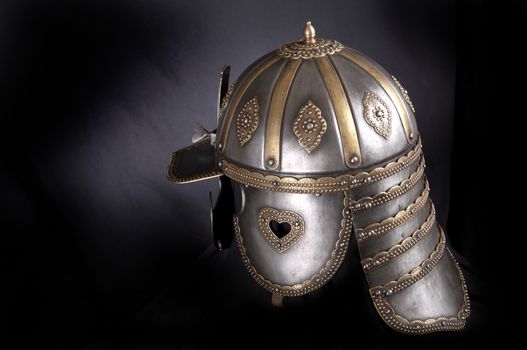 Iron helmet of the medieval knight. Very heavy headdress