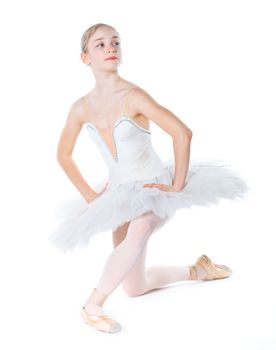 Beautiful young ballerina on a white background