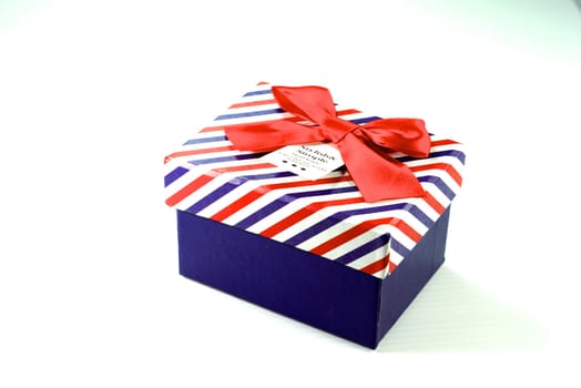 colorful gift box on white scene,shallow focus