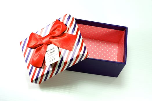 colorful gift box on white scene,shallow focus