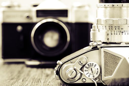 Detail view of classic cameras in monochrome vintage style