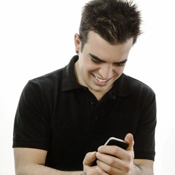 Happy young man looking at his smartphone