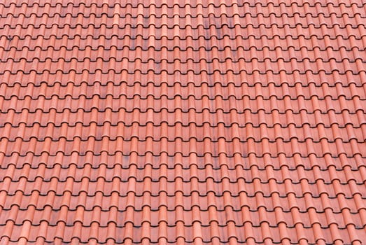 Red old tiles roof background