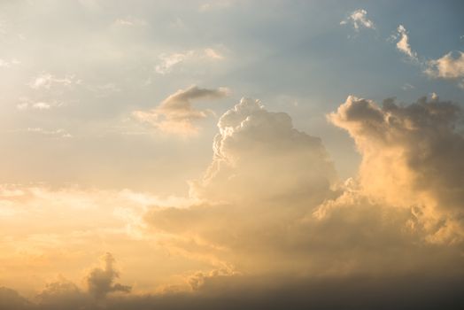 Sky with clouds burst rays of the sun