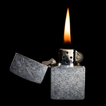 Silver metal zippo lighter isolated on black background