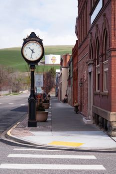 Clock Tower on the corner in a small town USA