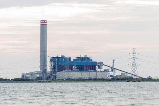 Power stations edge the sea at Rayong, Thailand.