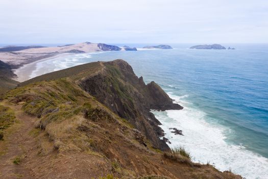 Deserted sand beach coast at Tasman Sea between Cape Reinga and Cape Maria van Diemen at northern tip of North Island of New Zealand