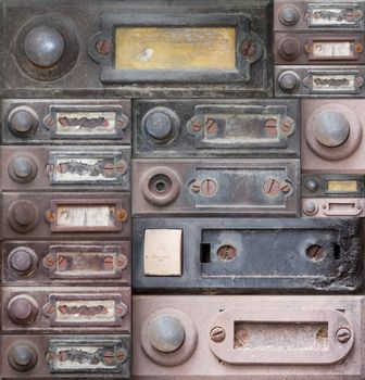 Various of the old and damaged doorbells - button