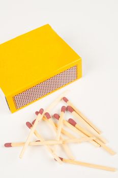 Wooden matches, matchbox and its striking surface