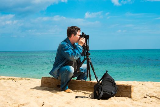 photographer takes pictures panorama of the sea seaside