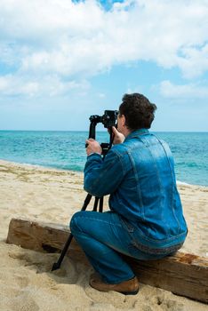 photographer takes pictures panorama of the sea seaside