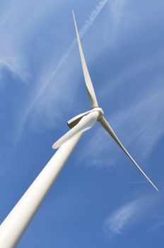 wind turbine at angle with sky background