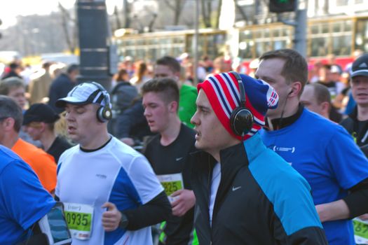 Warsaw, Poland – March  30, 2014: 9th Warsaw Half Marathon. Runner in hilarious and funny costume