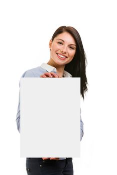 Happy smiling young woman showing blank signboard on white background