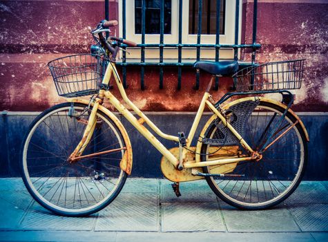 Rustic VIntage Old Bicycle On A Backstreet In Italy