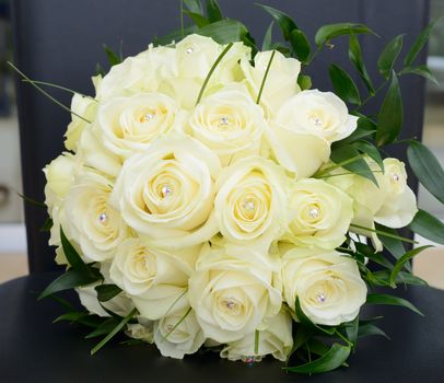 Brides bouquet of yellow roses closeup detail