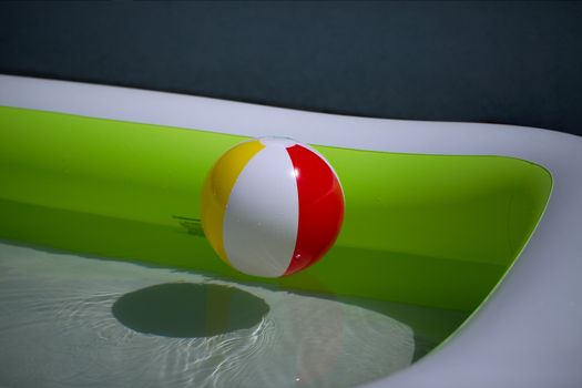 Rubber ball in a swimming pool