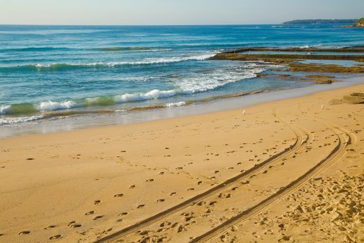 Sandy beach with blue sky