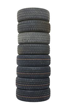 Many car tyres in a pile