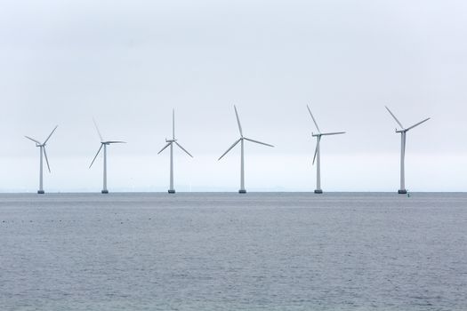 Offshore wind turbines at the sea in Copenhagen, Denmark