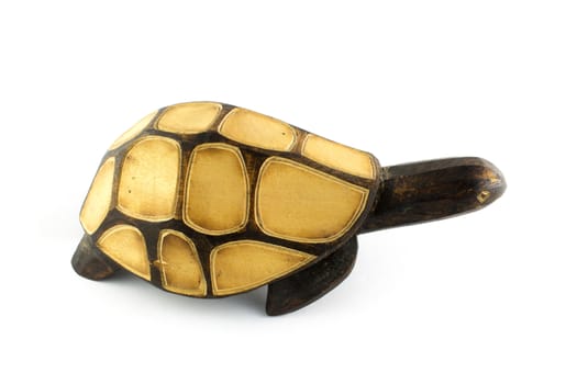 wooden turtle on a white background