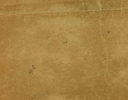 Blank sheet of old brown paper useful as a background