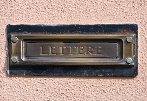 Typical Italian mailbox directly fixed on the wall