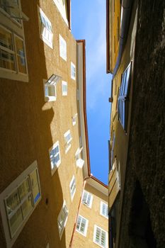 In between historic architecture in Salzburg, Austria, Europe.