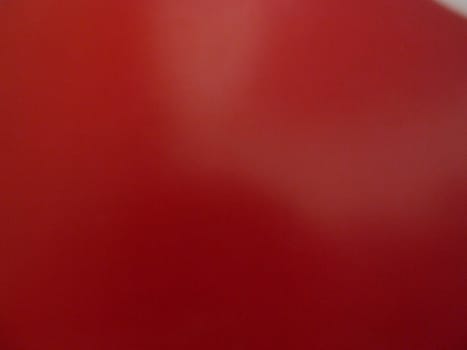 Almost a completely red surface as a background