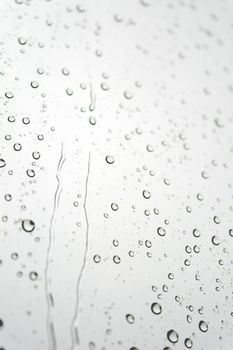 Drops of rain on the inclined window. Shallow DOF.