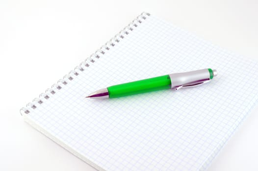 Green pen with copy-book