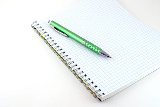 Green pen with copy-book