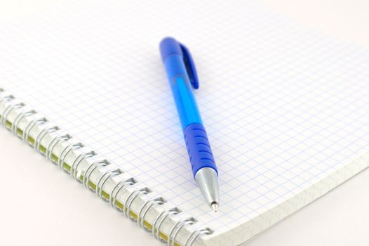 Blue pen with copy-book