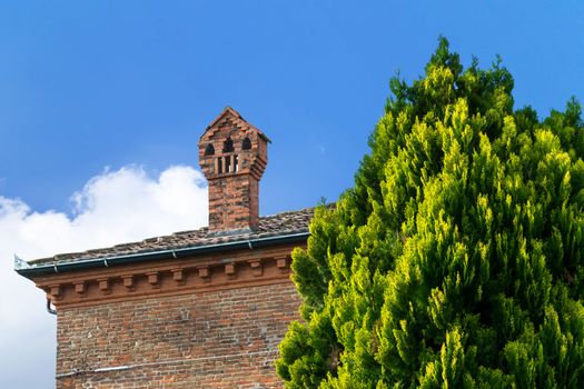 Chimney on the rooftop of a brick house