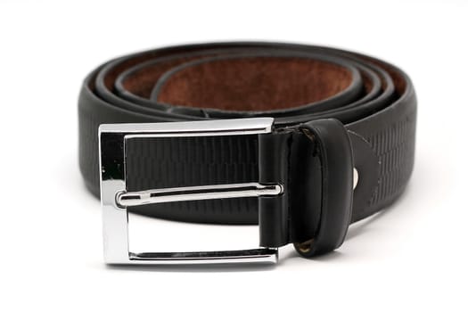 leather men's belt with silver buckle isolated on white background