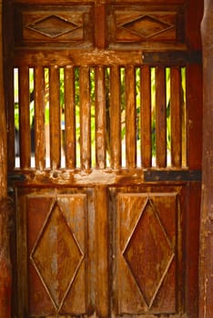 detail of the old style door  from the house of northern Thailand