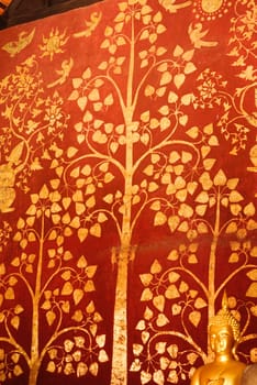 the detail of  thai gold painting pattern on temple wall,Lampang temple,Thailand