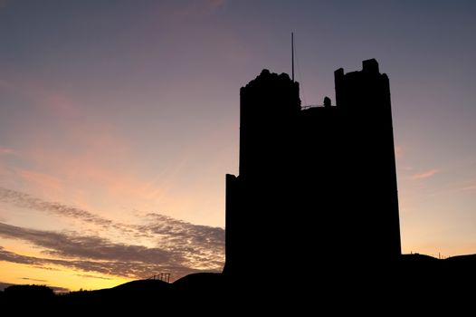 sunset silhouette of an historic english castle