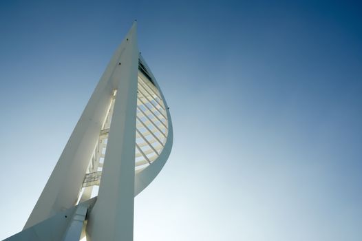 PORTSMOUTH, UK - FEBRUARY 1: Sunshine behind the 560ft (170m) Spinnaker Tower, one of the highest tourist observation platforms in the UK - Portsmouth, UK - February 1, 2012