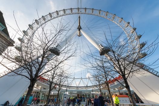 LONDON, UK -JANUARY 27, 2013:  The London Eye tourist attraction near the River Thames in London, UK