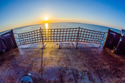 riding on a ferry boat at sunset 